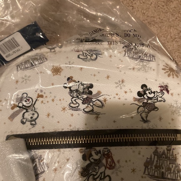 Disney holiday 2020 Dooney & Bourke mini backpack purse Christmas snowman Mickey